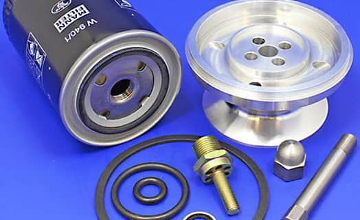 Spin-on oil filter conversion kits