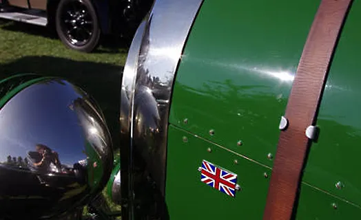 Image of vintage car with a leather bonnet strap